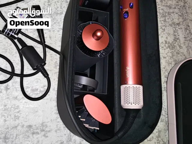 Dyson Airwrap i.d.TM multi-styler and dryer Straight+Wavy in Strawberry bronze and blush pink