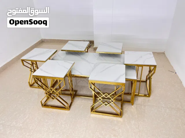 ادفع عند الاستلام طقم طاولات ضيافة استيل بتصميم انيق ولون ذهبي فاخر ورخام عالي الجودة من 7 طاولات