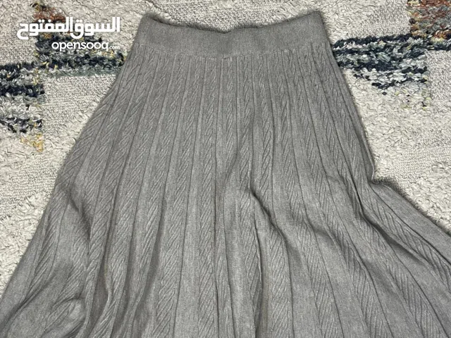 تنورة طول وسط