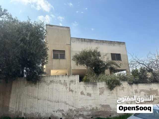 عقار ارض مع بناء للبيع