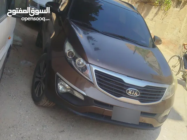 كيا سبورتاج R 2011 كاملة مسكرة رقم 1 لون جردوني كراسي كهرباء جلد اسود فيميه أساسي