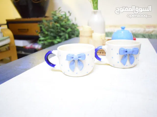 Charming mugs with bow