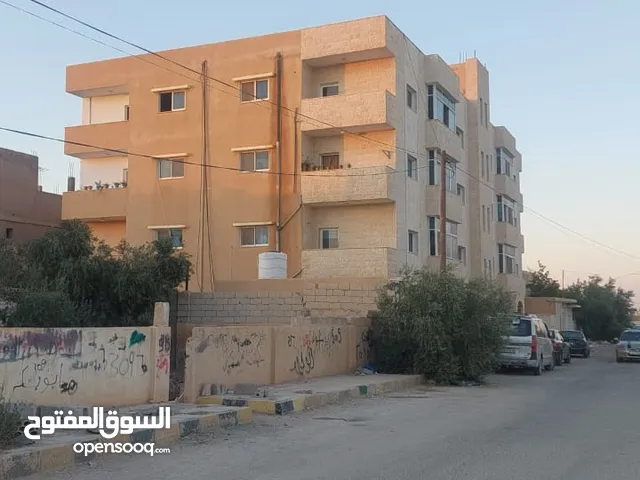 شقة للبيع معان طريق اذرح