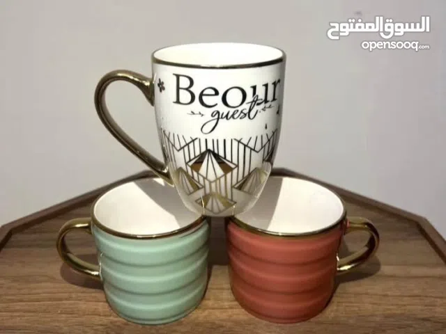 مجموعة فناجين سيراميك أنيقة بحواف ذهبية – جديد