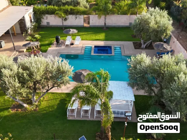 Private Villa Nathalie Marrakech surrounded by olive groves, mountains, and absolute tranquility