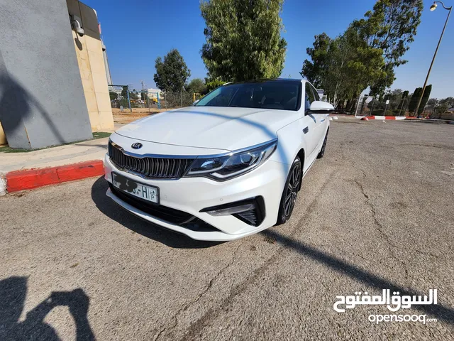 Kia Optima 2018 — لون أبيض لؤلؤي تحفة