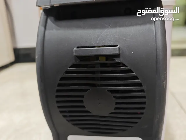 جهاز يستخدم للسيارة لحفظ البرودة او لحفظ الحرارة للطعام والمشروبات