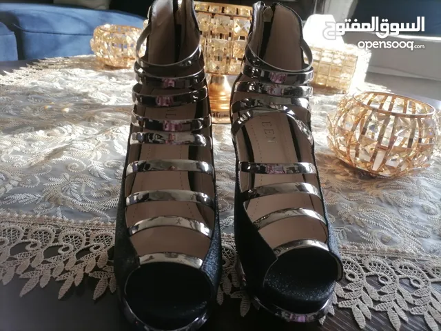 Black With Heels in Amman