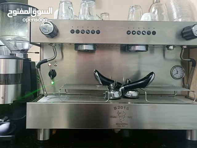ماكينة اسبريسو ومطحنة قهوة