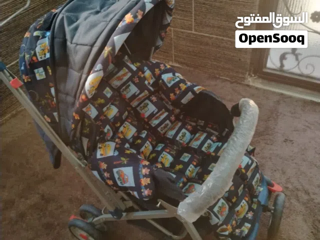عربايه اطفال جديد لم تستخدم الا مره واحده بكرتونه