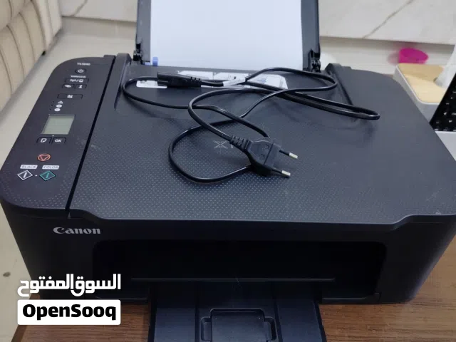 طابعة كانون بحالة ممتازة مع كامل قطعها وورق A4