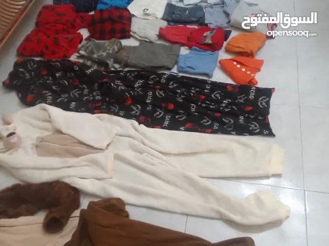 55 قطعة ملابس نخب منھم بورقتة بيبي / اطفال / بناتي / ستاتي مشكل صيفي شتوي ربيعي