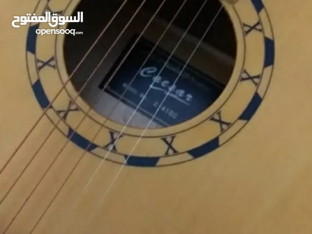 جيتار اكوستيك شبه مستعمل "القصير"