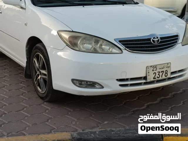 كامري 2004 بحاله جيده  جير مكينه شاسي ممتاز