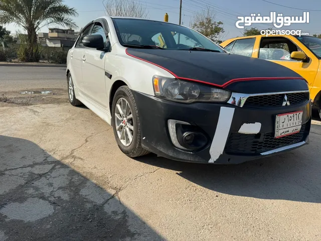 لانسر قرش 2016 وارد امريكي محرك 2000 بيها منظومة غاز بنيد مبدل فقط بدون دواخل بدون ايرباك 108$