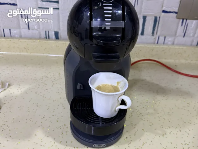 ماكنة صناعة القهوه الساخنه والبارده من شركت ديلونجي كوستى اقره الوصف