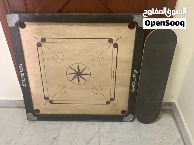 Skate board, very good condition and carrom board, good condition