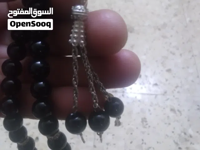مسبحه الزبرجد والحجار الكريمه بوزن 56غرام ومسبحه لولي بوزن 35غرام