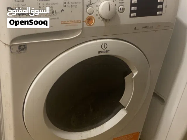 غسالة ملابس  السعر خمسة5 شغالة بس ماتسحب الماي