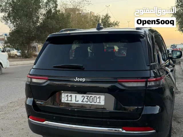 جيب كراند شيروكي لمتيد هايبرد بلك ان 2024 بحالة الوكالة  مكفولة رقم بغداد23001