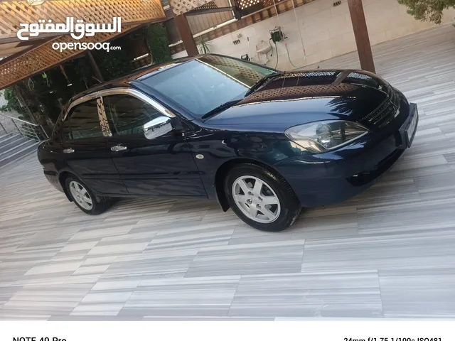 ميتسوبيشي لانسر كويتي اصلي 1600 فحص كامل وضع الشركه لسا 2007 مالك واحد استعمال بسيط