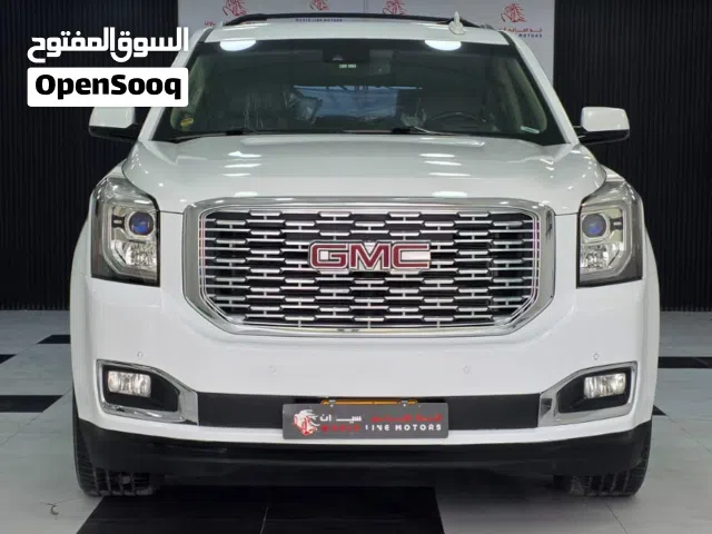 GMC YUKON XL السيارة العائلية باللون الابيض الانيق والشكل الجميل عائلية اعتمادية لكافة الطرق والظروف