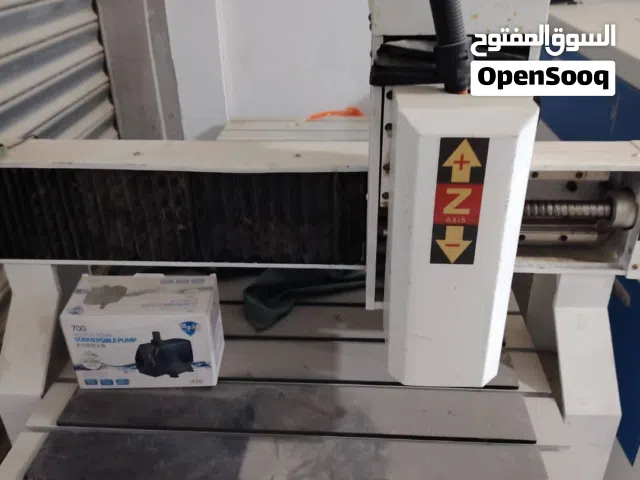 ماكينة CNC Router + ماكينة Laser Cutter