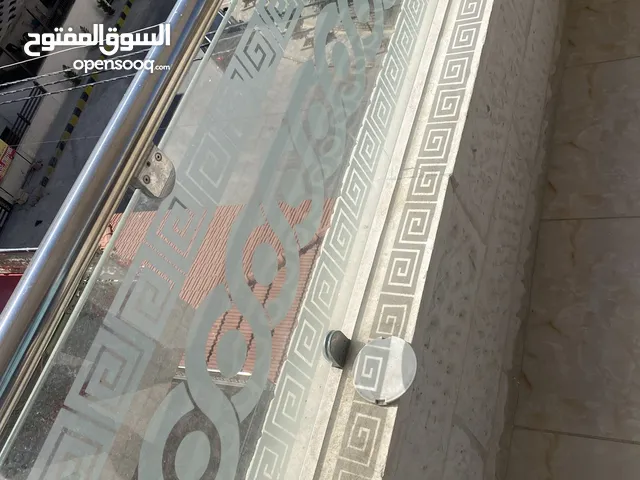 دربزين بلكونة خارجي سيكوريت (زجاج)