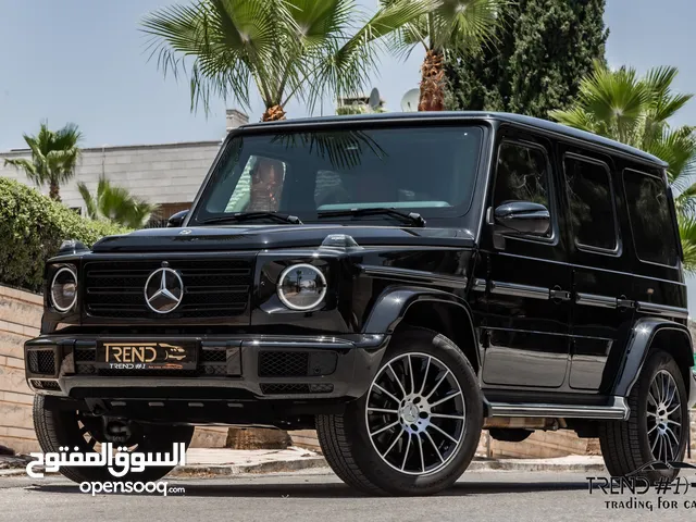 Mercedes G500 2024 Amg kit Night Package السيارة وارد و كفالة الشركة و قطعت مسافة 2,000 كيلو