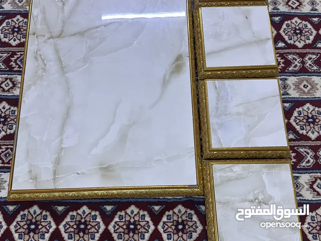 طاولات ذهبيه رخام