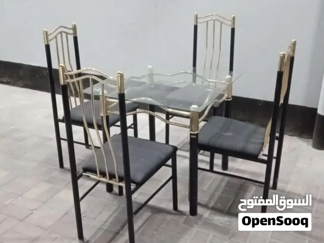 طاولة طعام اربعة كراسي نظيف زجاج