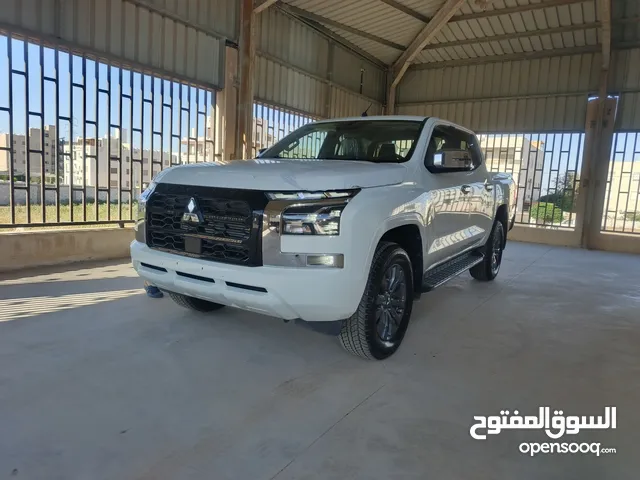 ميتسوبيشي سبورتيرو موديل 2024 هاي بور GLS (181 حصان) 2400 cc ديزل تيربو ناقل حركه اتوماتيكي