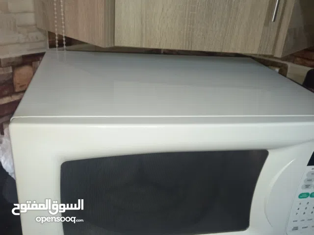 مايكرويف  LG شغال ميه بالميه اكبر حجم موجود بالسوق يتسع لسدر قياس 40 سم حالته ممتازه خالي من الخدوش