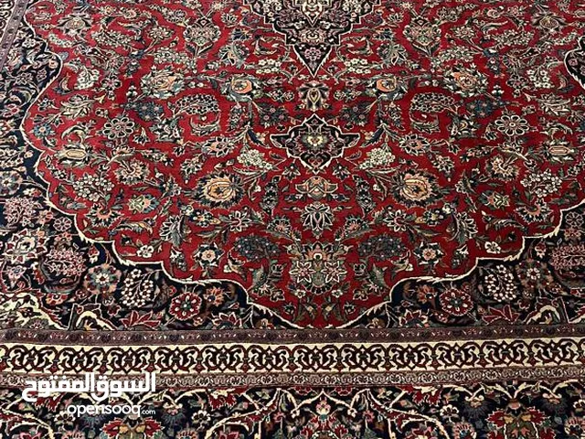سجادة أنتيك نادرة – صناعة يدويّة من كاشان – فوق الـ100 سنة