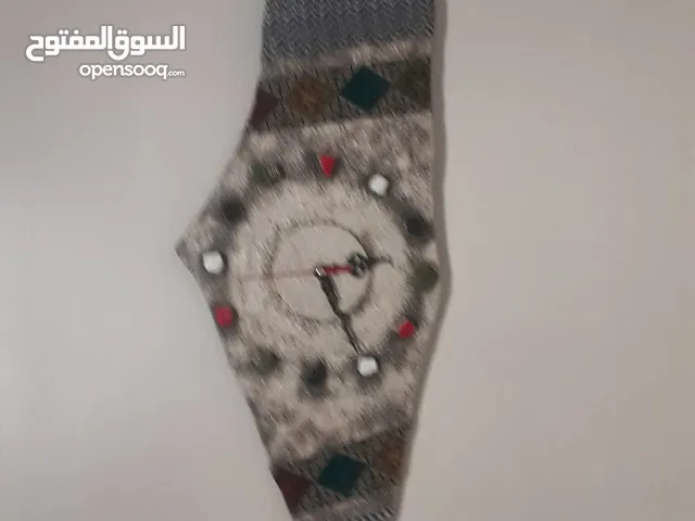 ساعة على شكل خارطة فلسطين