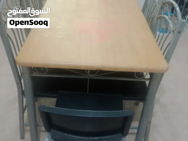 طاولة سفرة خشب والكراسي