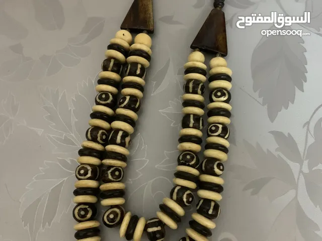 عقد عظم الباتيك من كينيا الون الابيض والبني ولاسود