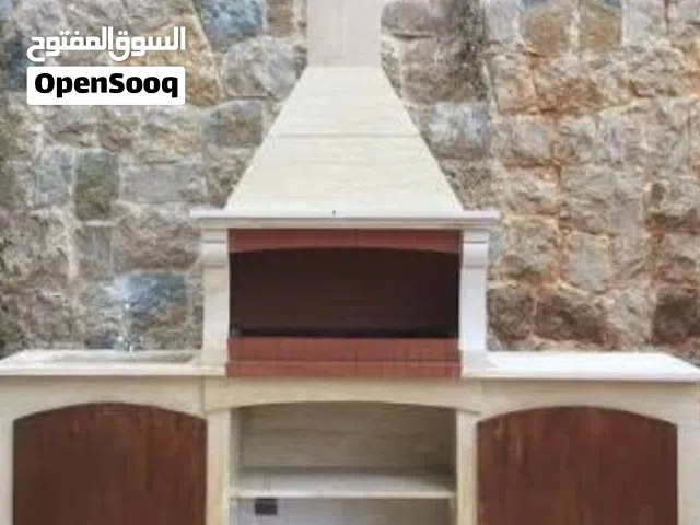 شلالات وديكورات ومغاسل وطاولات وباربكيو حدائق