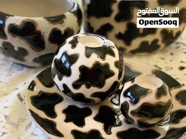 مزهريات وشمعدان