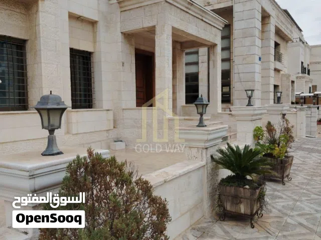 شقة أرضية مميزه 306م في أجمل مناطق عبدون / ref 1032