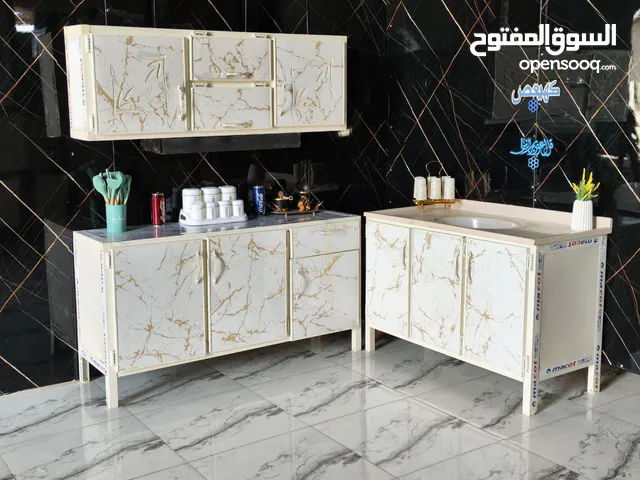 كاونتر ارضي وملحق متر ونص سنك متر وعشرين السنك مرمر صناعي