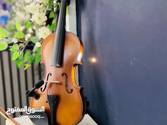 كمان ( كمنجه ) الة موسيقية