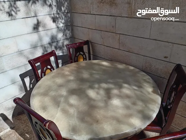 طاولة سفره جرانيت مع5كراسي خشب ممتاز