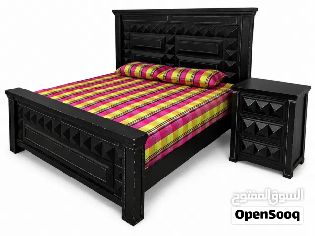 Furniture contains a bed with a side table, a wardrobe, a closet, a glass table, computer table