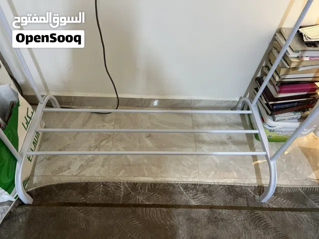 علاقة ملابس حجم كبير