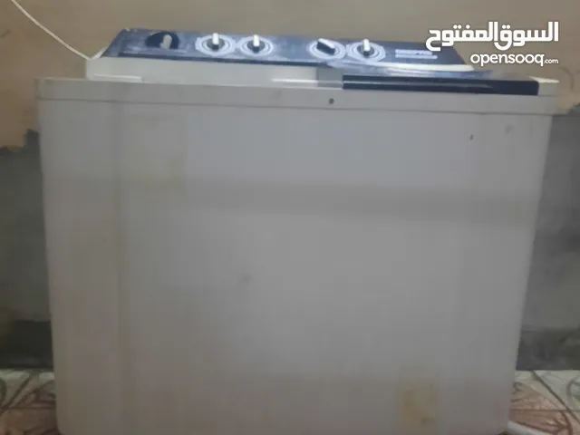 غسالة وعصاره