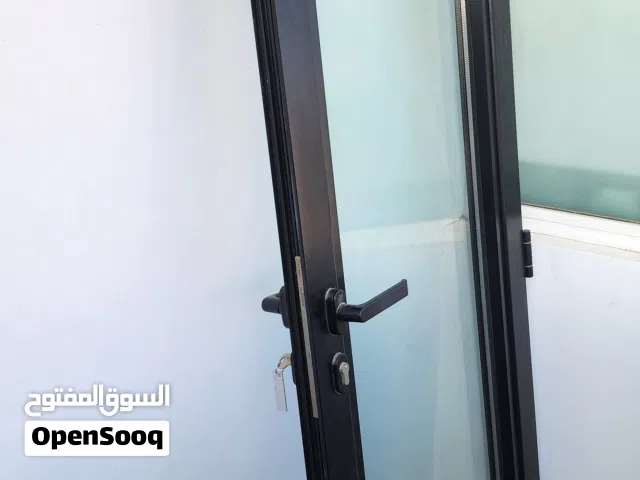 باب الامونيوم ممتاز مقاس 66×220 سم  بزحاج مزدوج مانع للصوت مع القفل وبذون اطار