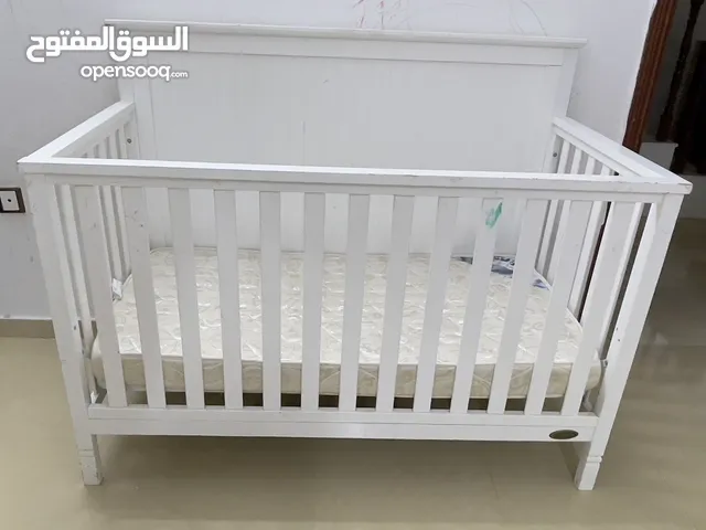 Baby shop wooden cot with Raha spring mattress
