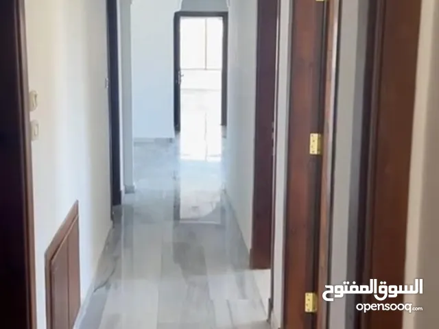 Excellent natural light and winds with views of Shafa Badran from the highest level in the building.