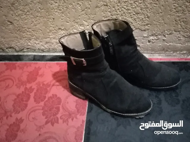 Black Boots in Alexandria